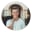 M H
